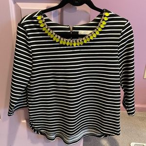 Medium black and white top with fun neckline